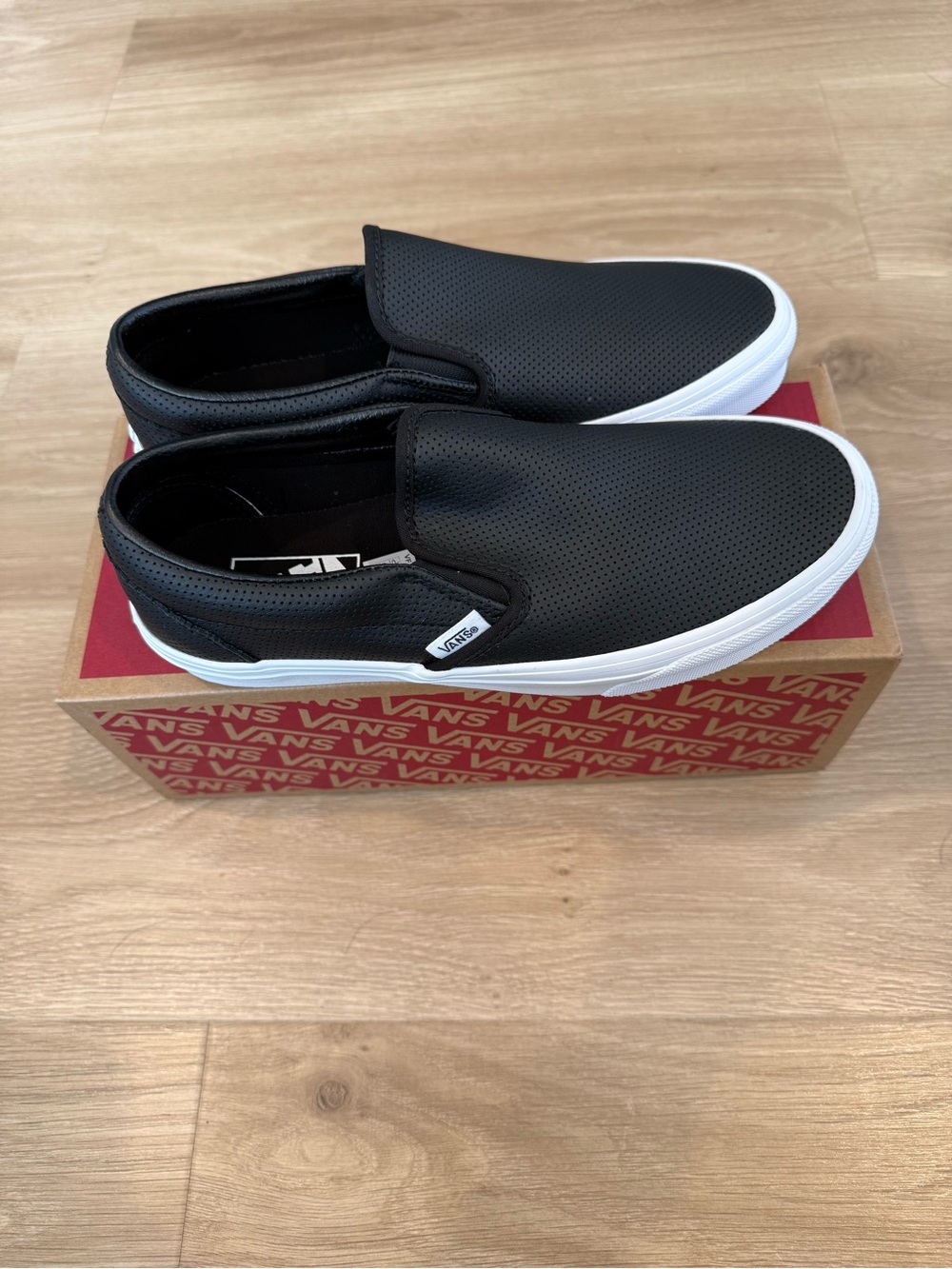 Vans Black Slip-On Perforated Leather with White Sole